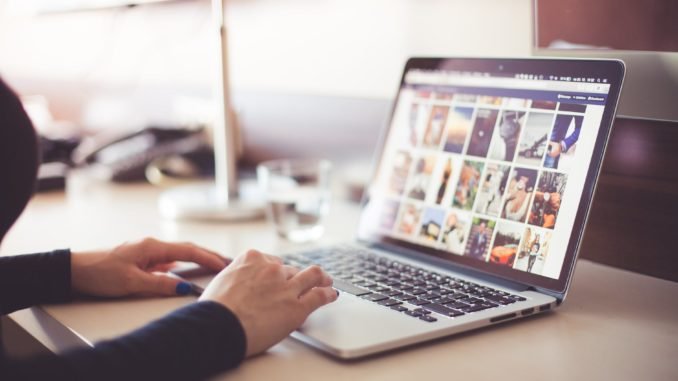 person using laptop computer during daytime