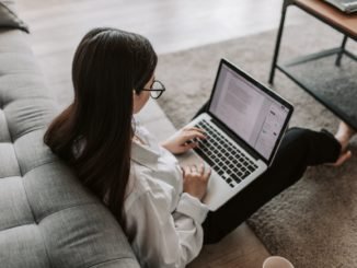 woman working at home using her laptop